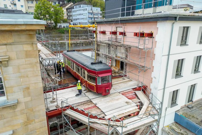 Liebherr LTM 1450-8.1 mobile crane set up on the narrow access road at Wuppertal Central Station