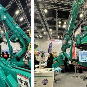 Maeda MC815 spider crane lifting an MC285C mini crane at the ONEBUILD 2026 exhibition in Kuala Lumpur
