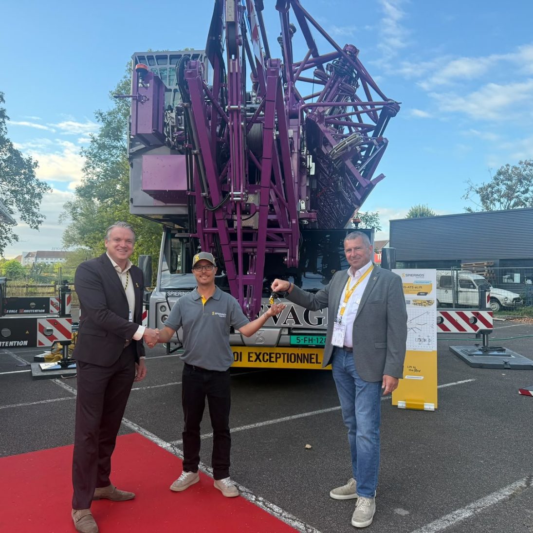 Purple Spierings SK1265-AT5 eLift mobile tower crane of HR Levage at the key handover