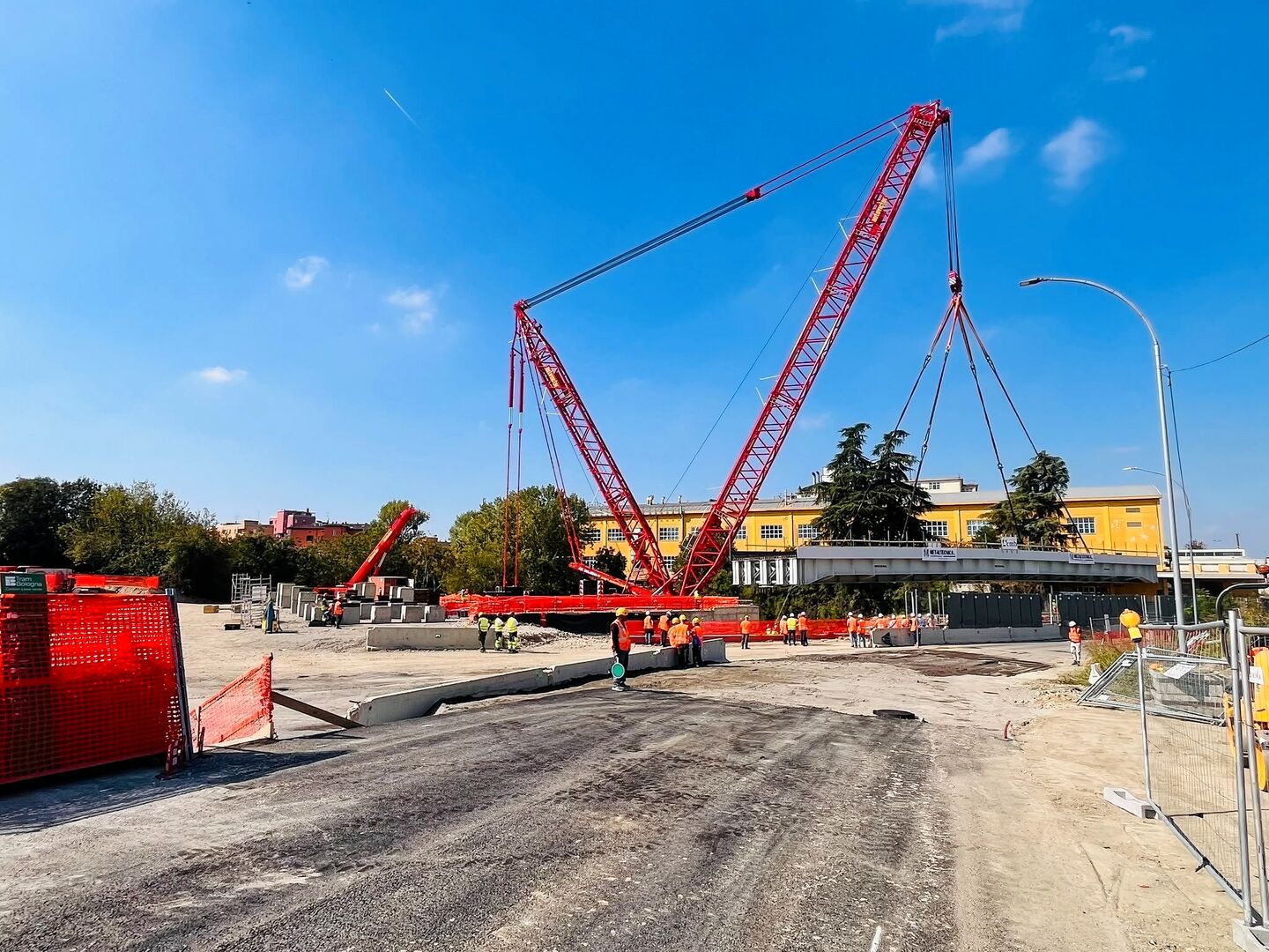 Tadano CC 38.650-1 positioning the 45-metre tram bridge over the Navile Canal in Bologna